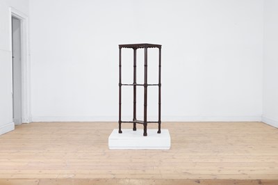Lot 157 - A George III-style mahogany étagère