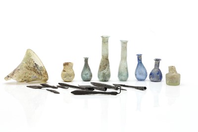 Lot 225 - A collection of Roman glass vials