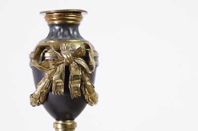 Lot 22 - A pair of Louis XVI gilt-bronze and patinated bronze cassolettes