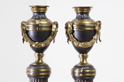 Lot 22 - A pair of Louis XVI gilt-bronze and patinated bronze cassolettes