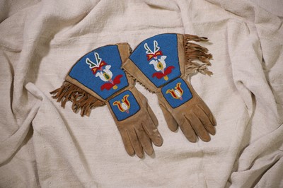 Lot 307 - A pair of Native American beaded hide gauntlets