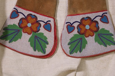 Lot 312 - A pair of Native American beaded hide mittens