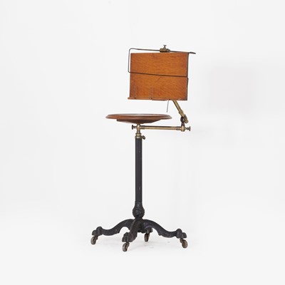 Lot 255 - A Victorian cast iron 'Literary Machine' reading table