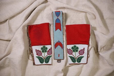 Lot 339 - A pair of Native American beaded hide and cloth leggings