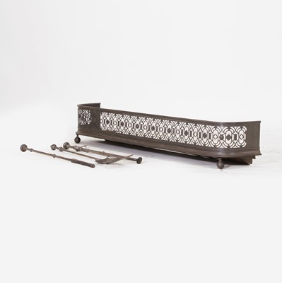 Lot 143 - A Regency polished steel fire kerb