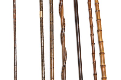 Lot 55 - A group of seven silver and gold mounted walking sticks