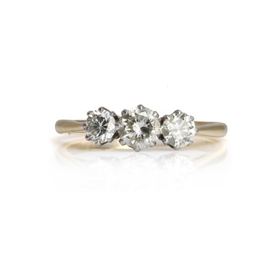 Lot 84 - A three stone diamond ring