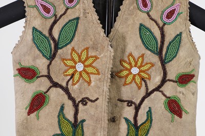 Lot 372 - A Native American beaded hide child's jacket