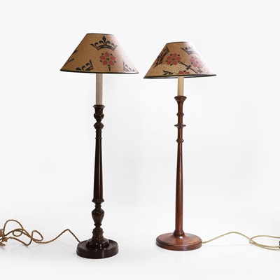 Lot 383 - A matched pair of mahogany candle lamps and shades