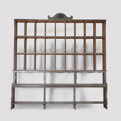 Lot 44 - A painted pine shop display shelf