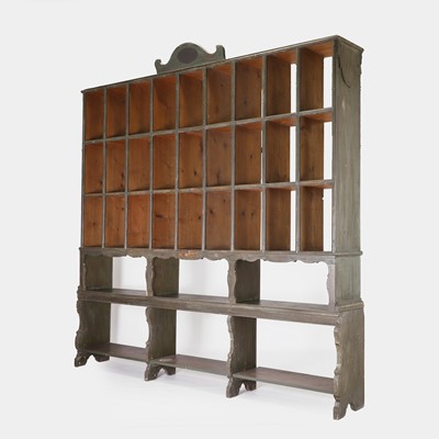 Lot 44 - A painted pine shop display shelf