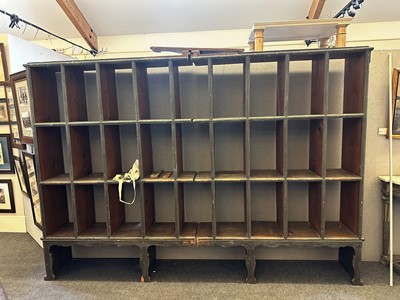 Lot 44 - A painted pine shop display shelf