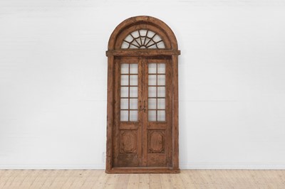 Lot 582 - An Arts & Crafts panelled wooden door frame