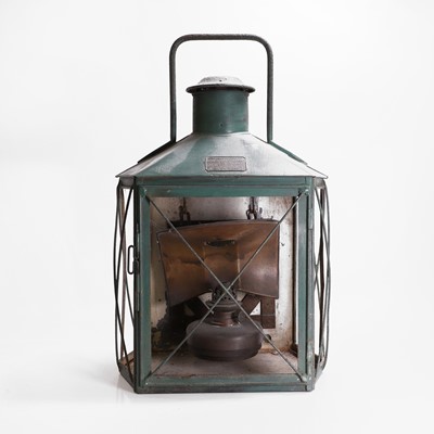 Lot 311 - A painted tinplate paraffin lantern