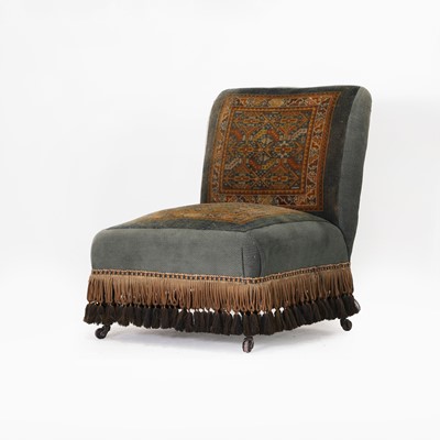 Lot 60 - A Victorian low chair