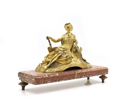 Lot 474 - A gilt-metal figure