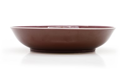 Lot 193 - A Chinese sang-de-boeuf glazed dish