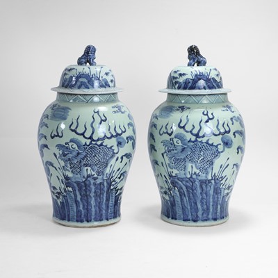 Lot 29 - A pair of large blue and white baluster vases and covers