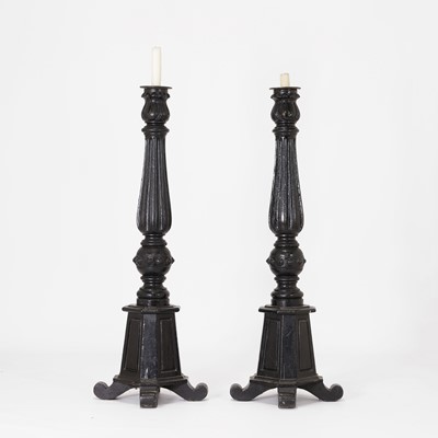 Lot 31 - A pair of Victorian black-painted torchères