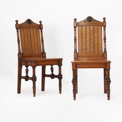Lot 216 - A pair of Victorian oak hall chairs