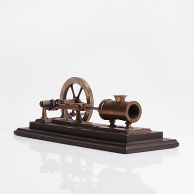 Lot 112 - A novelty brass mechanical cigar cutter
