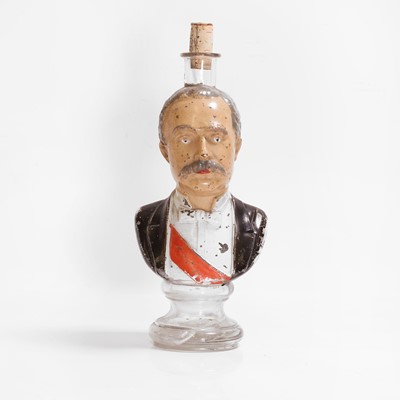 Lot 107 - A polychrome-painted glass figural bottle