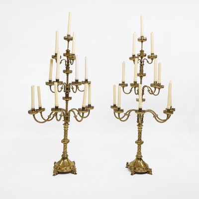 Lot 87 - A pair of large Gothic-style brass candelabra
