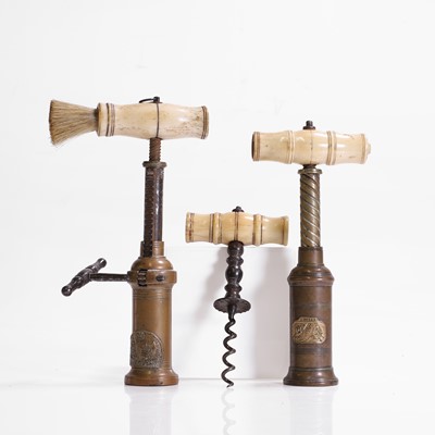 Lot 110 - A collection of three corkscrews
