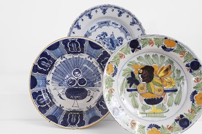 Lot 154 - A group of three delftware chargers