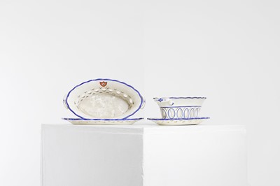 Lot 155 - A pair of Spode creamware chestnut baskets on stands