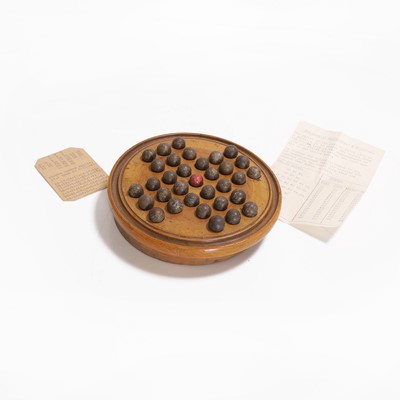 Lot 64 - A travelling solitaire board and balls