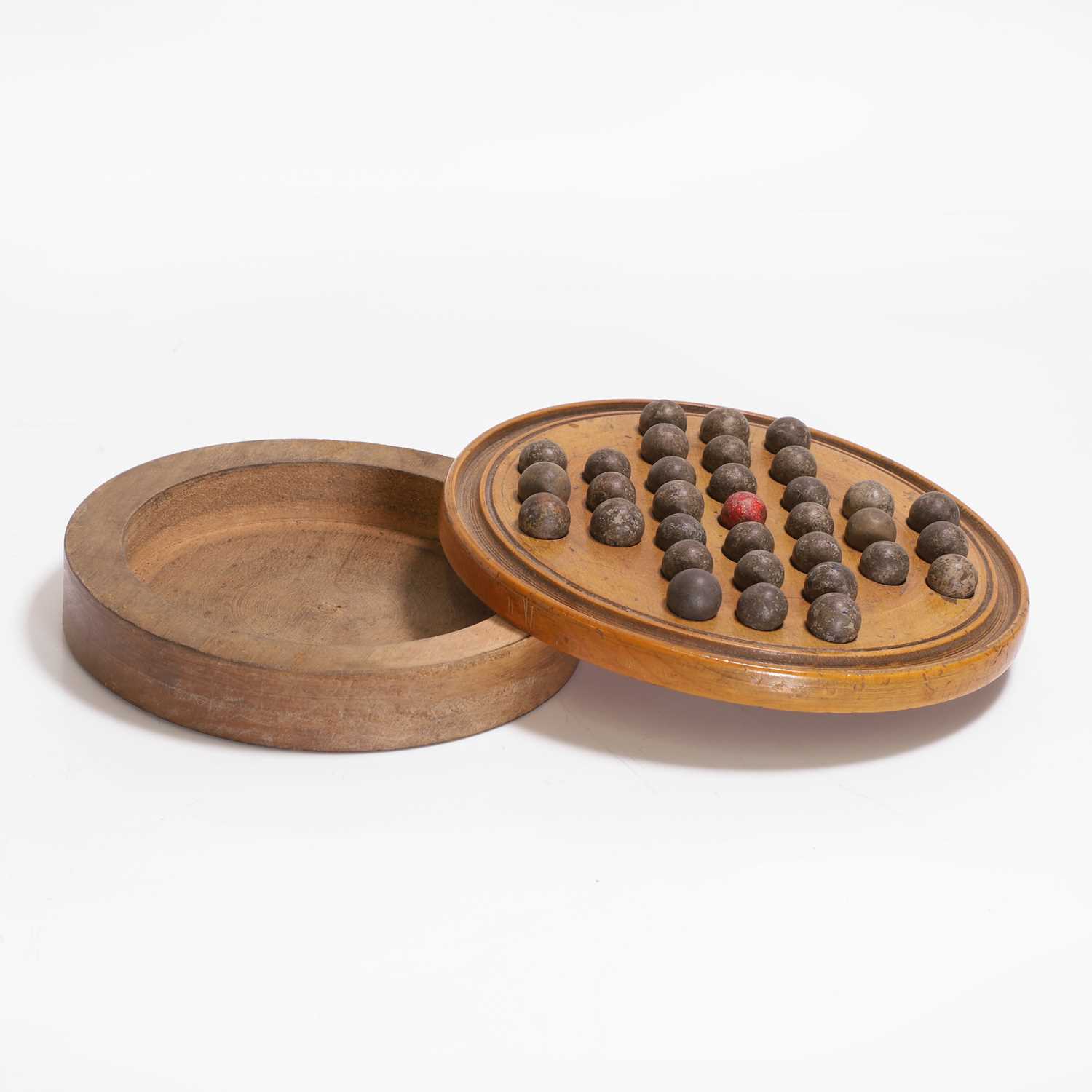 Lot 64 - A travelling solitaire board and balls