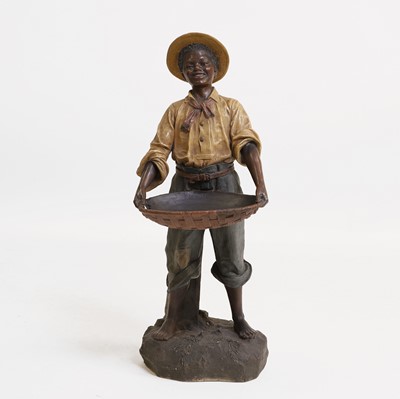 Lot 81 - A painted terracotta figure
