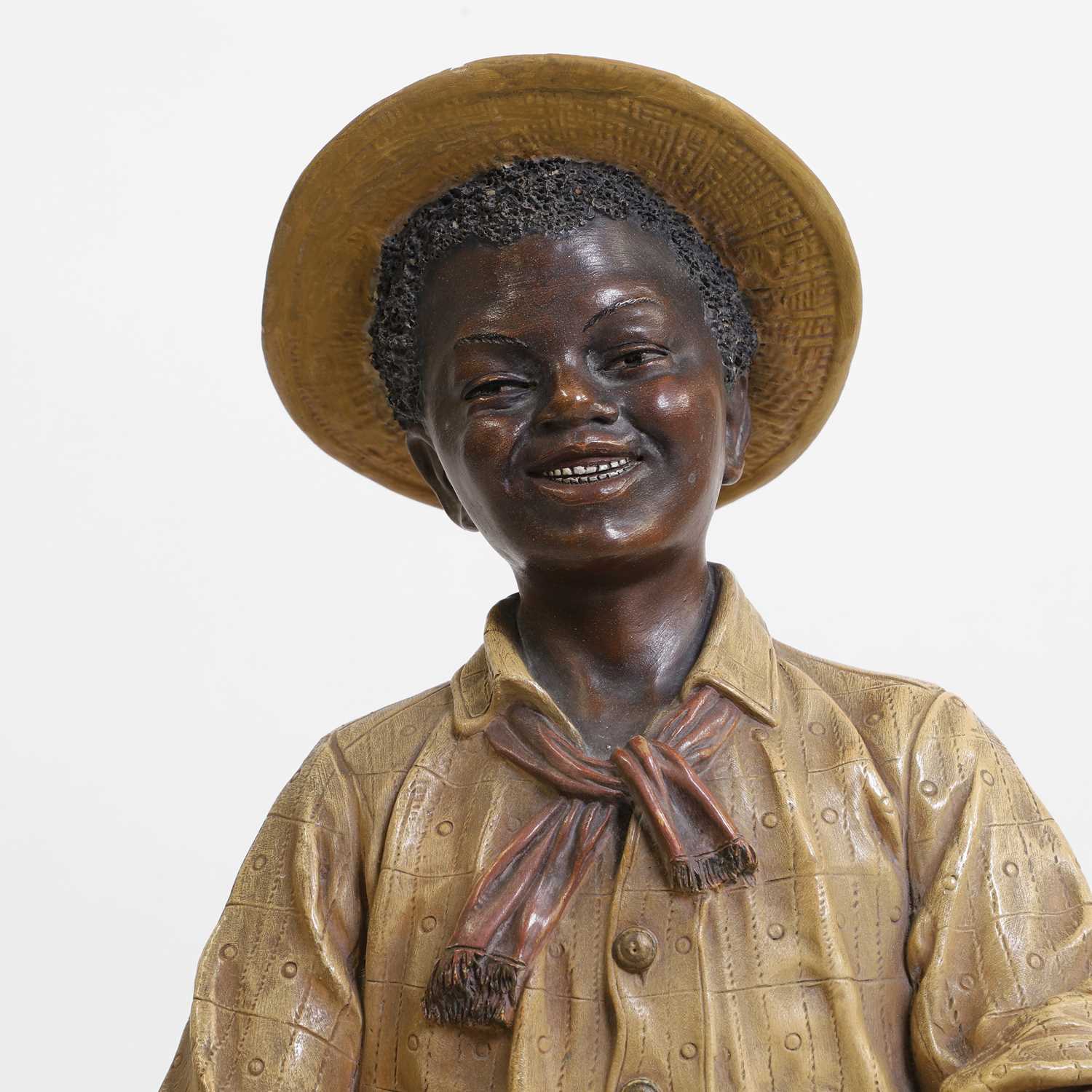 Lot 81 - A painted terracotta figure