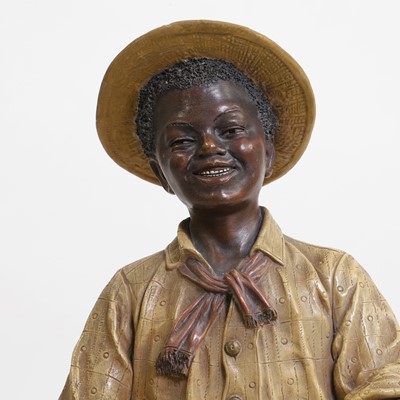 Lot 81 - A painted terracotta figure