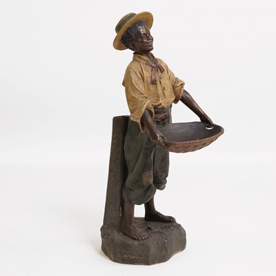 Lot 81 - A painted terracotta figure