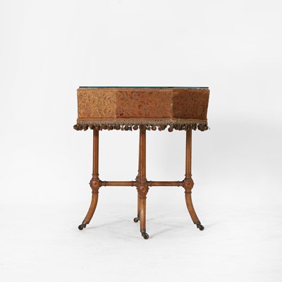 Lot 76 - An Aesthetic period walnut octagonal centre table