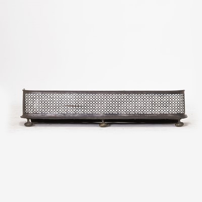 Lot 74 - A pierced steel fender