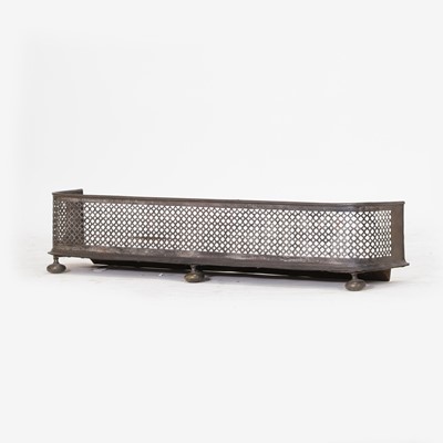 Lot 74 - A pierced steel fender