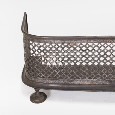 Lot 74 - A pierced steel fender