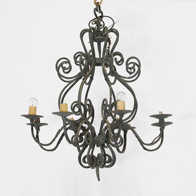 Lot 370 - A wrought-iron eight-light chandelier