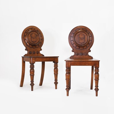 Lot 314 - A pair of Victorian oak hall chairs