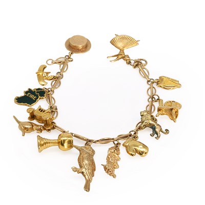 Lot 444 - A 9ct gold charm bracelet