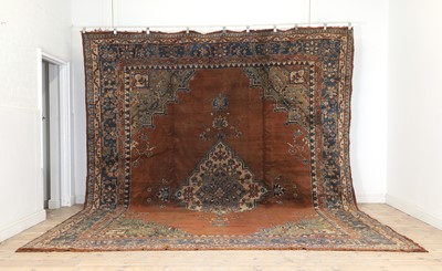 Lot 417 - An Oushak wool carpet