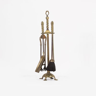 Lot 342 - A set of Arts and Crafts brass fire tools
