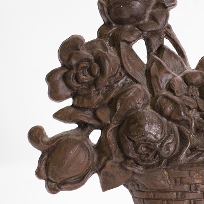 Lot 350 - A cast iron doorstop