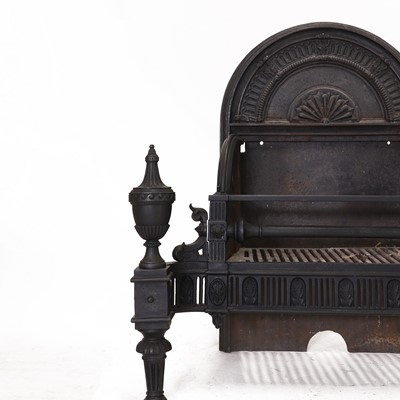 Lot 357 - A George III-style cast iron fire basket