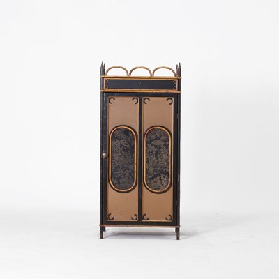 Lot 222 - A bamboo and lacquered single door cabinet