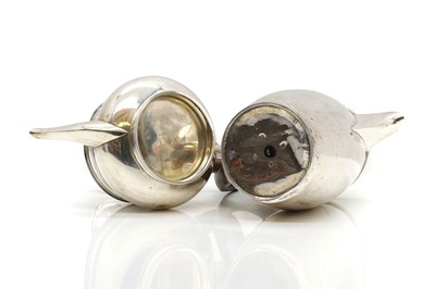 Lot 32 - A George III silver hot water pot