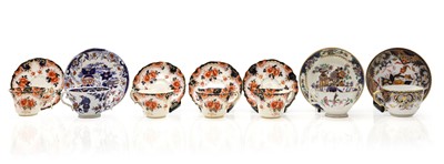 Lot 214 - A collection of porcelain teacups and saucers